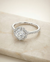 Round Brilliant, Vintage Scalloped Halo, in Platinum, pave setting – angled view | RockHer
