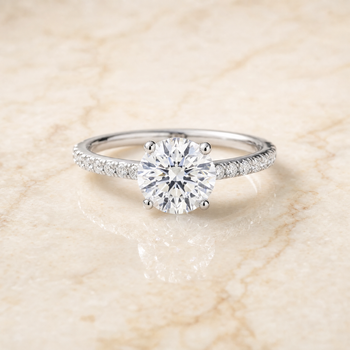 The Donna Cathedral French Pavé Solitaire Round Engagement Ring Setting in 18K White Gold