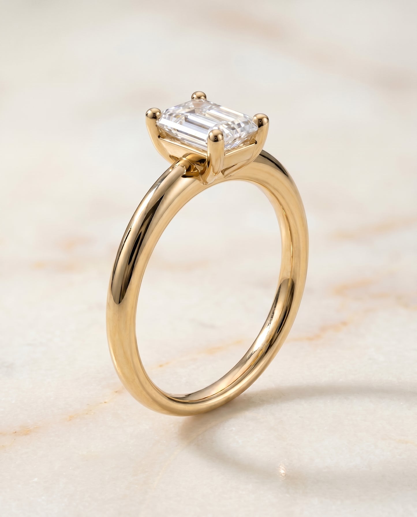 The Tori Solitaire Engagement Ring Setting for Emerald Cut Diamonds in 18K Yellow Gold
