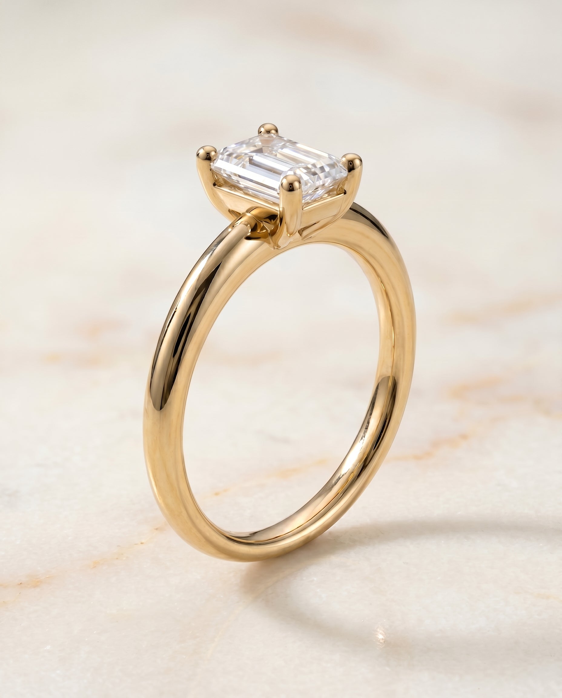 Rounded Comfort Fit Solitaire Cut styling on The Tori emerald engagement ring setting | RockHer