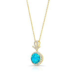 Swiss Blue Topaz Halo Pendant in 14K Yellow Gold – side profile | RockHer