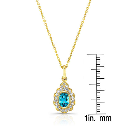 Blue Topaz And Diamond Oval Bezel Pendant With Teardrop Scallop Frame In 14k Yellow Gold (7x5mm) Adj Chain