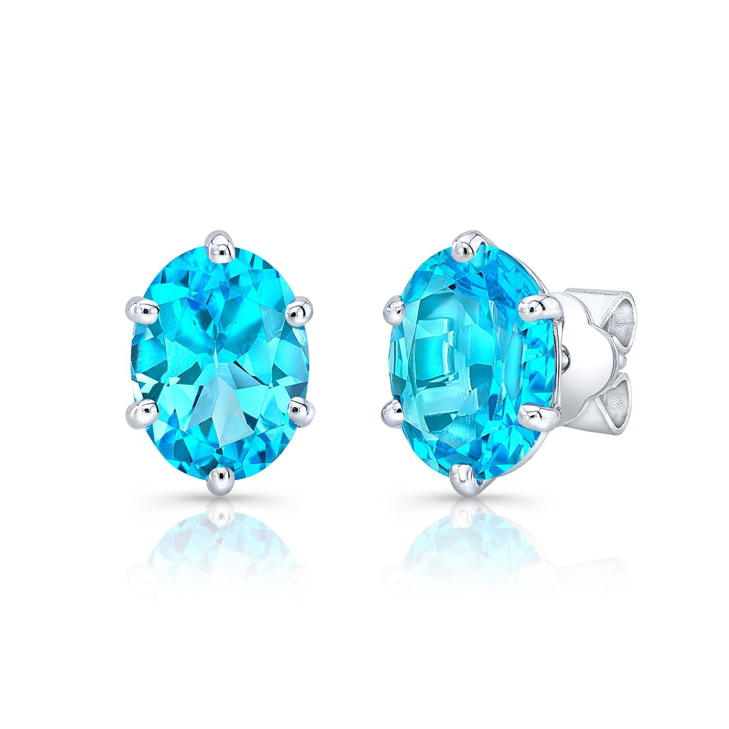 Blue Topaz Oval Stud Earrings In 14k White Gold (8x6mm)