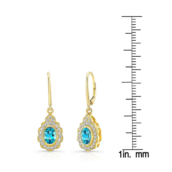 Blue Topaz And Diamond Oval Bezel Leverback Earrings With Teardrop Scallop Frame In 14k Yellow Gold (7x5mm)