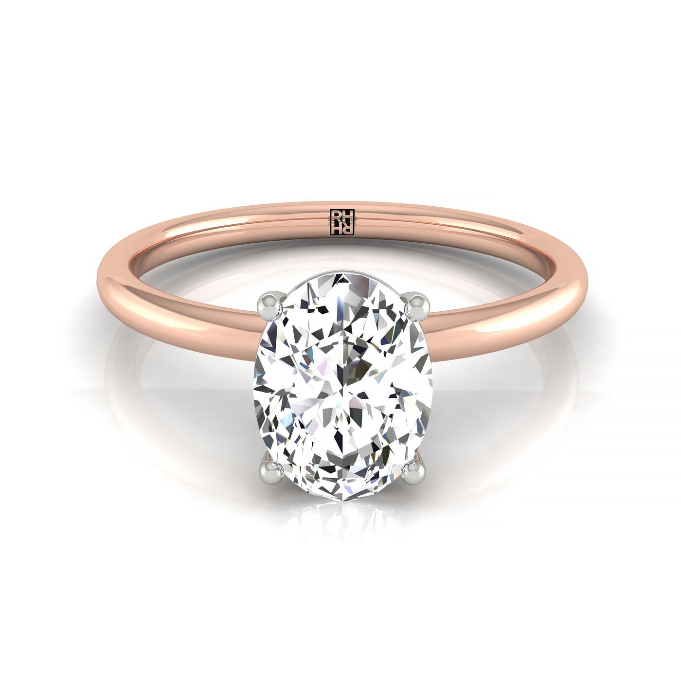 The Cyndi curved hidden halo solitaire engagement ring setting, shown in 14K Rose Gold | RockHer