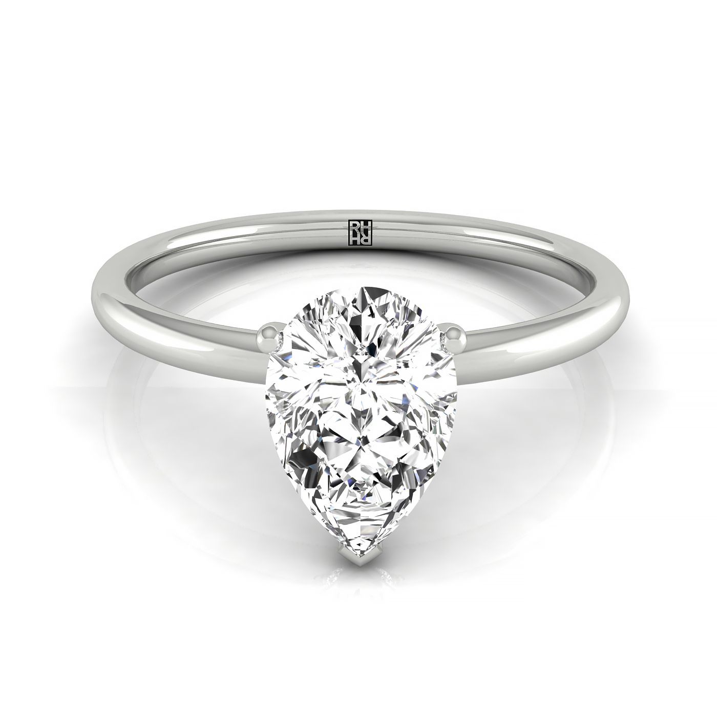 The Joni hidden halo solitaire engagement ring setting, shown in 18K White Gold | RockHer
