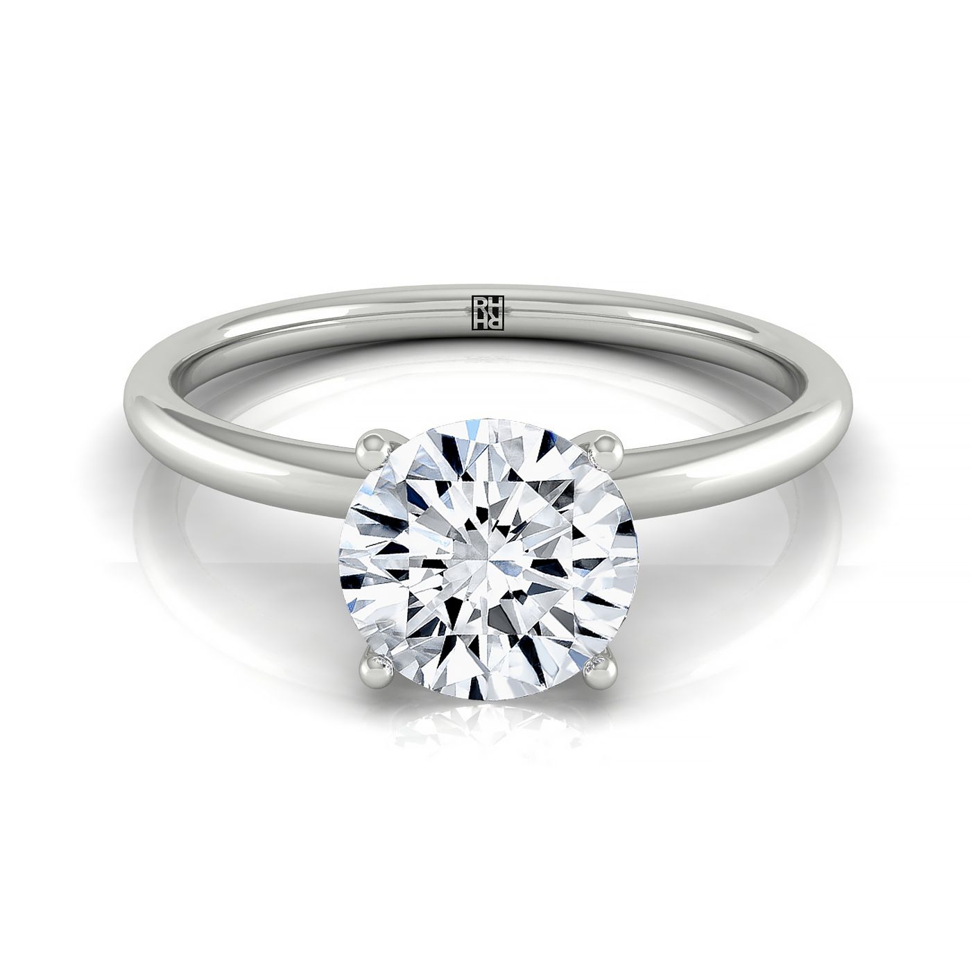 The Joni hidden halo solitaire engagement ring setting, shown in 18K White Gold | RockHer