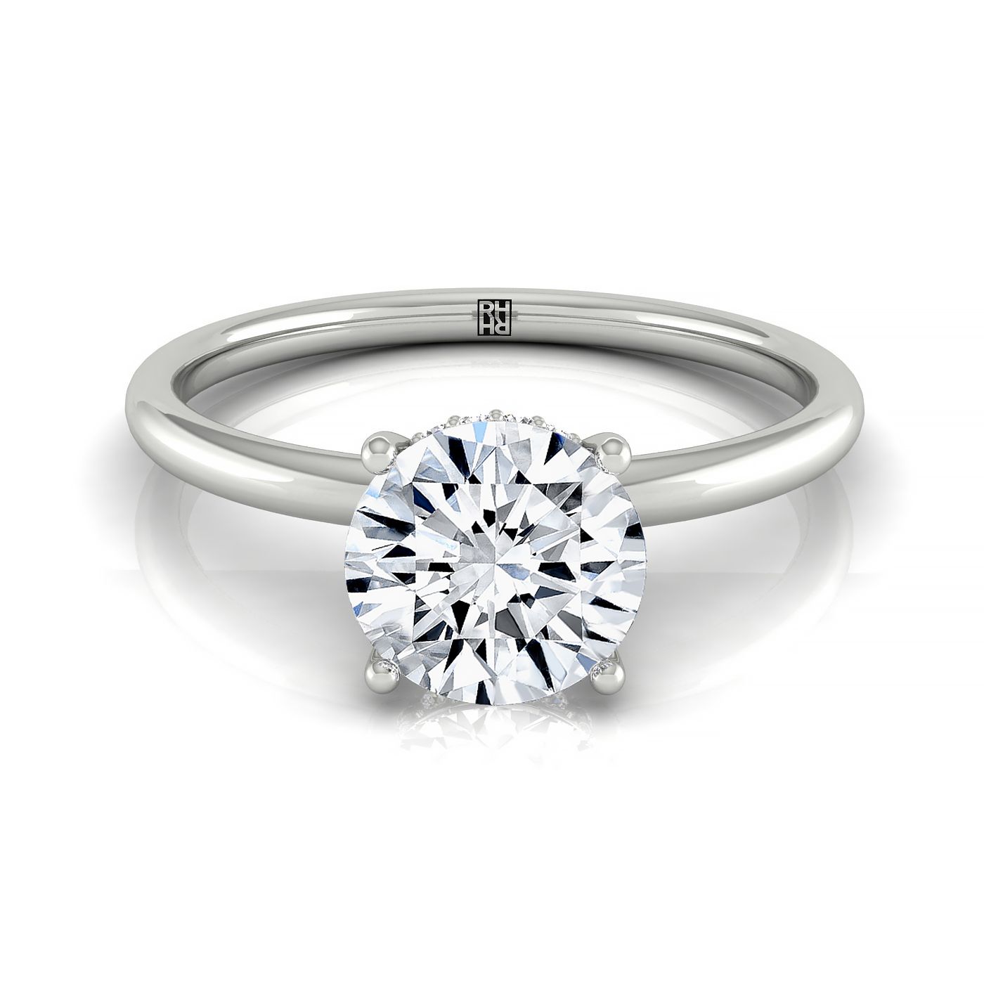 The Eartha round setting in Platinum, a upper hidden halo solitaire design from RockHer