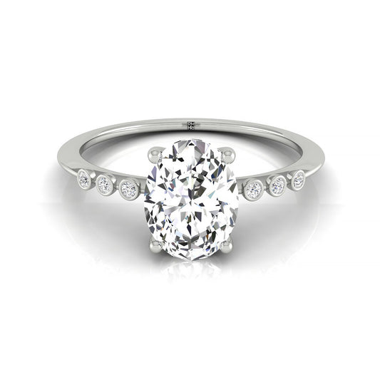 18kw Oval Engagement Ring With 6 Bezel Set Round Diamonds On Shank