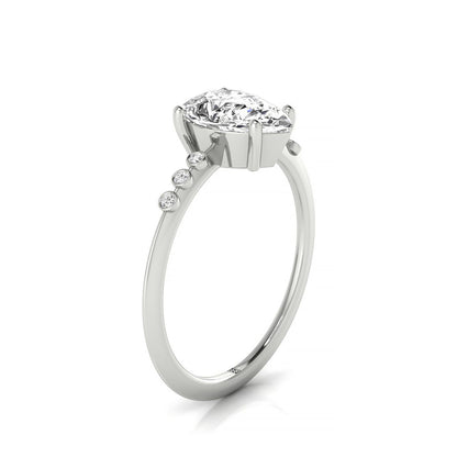 Plat Pear Engagement Ring With 6 Bezel Set Round Diamonds On Shank