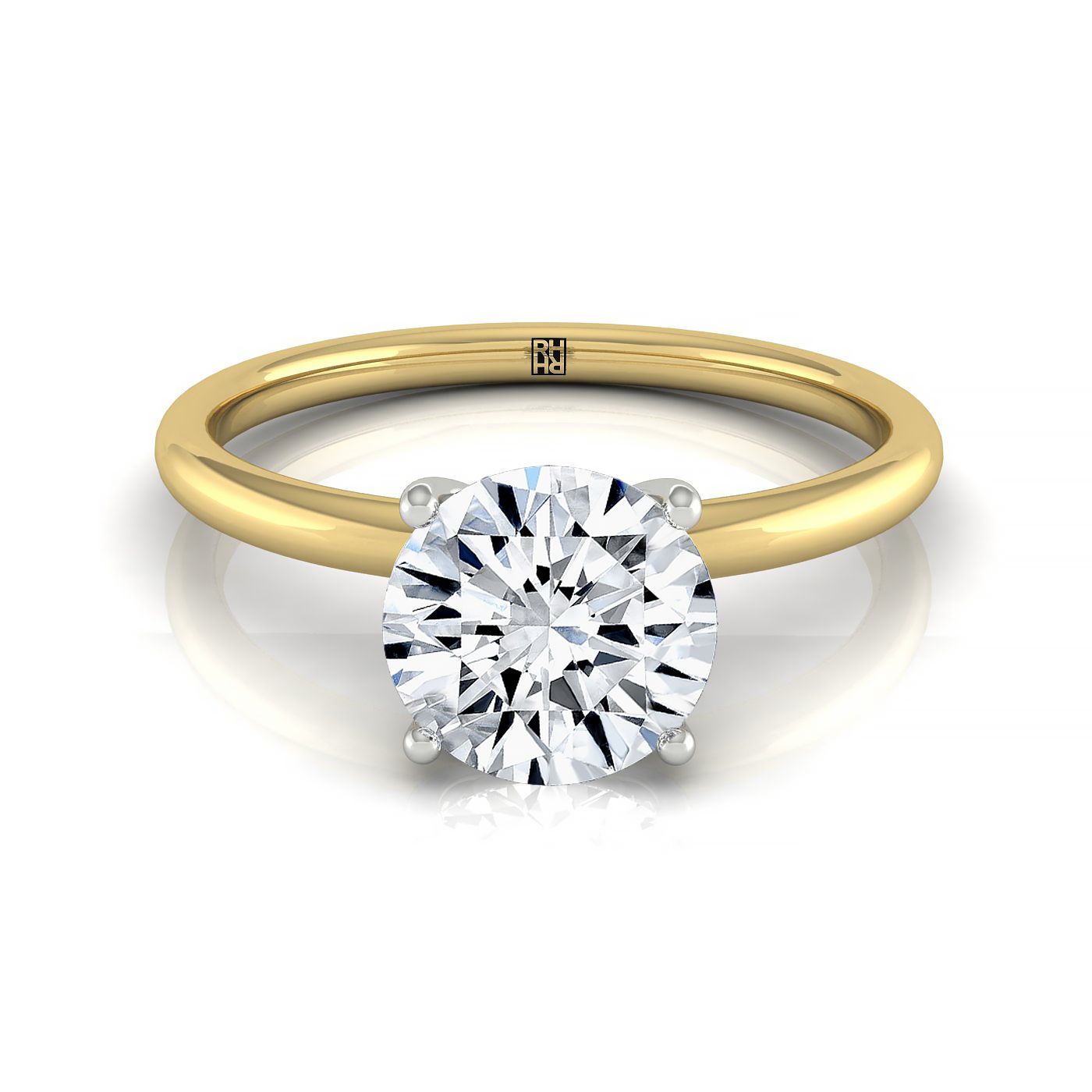 The Cyndi round setting in 18K Yellow Gold, a curved hidden halo solitaire design from RockHer