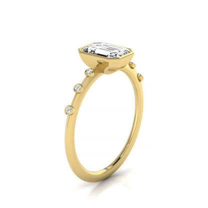 18ky Bezel Set Emerald Engagement Ring With 6 Bezel Set Round Diamonds On Shank