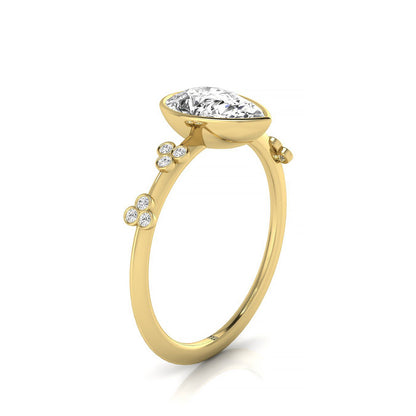 14ky Bezel Set Pear Engagement Ring With 12 Clover Bezel Set Round Diamonds On Shank